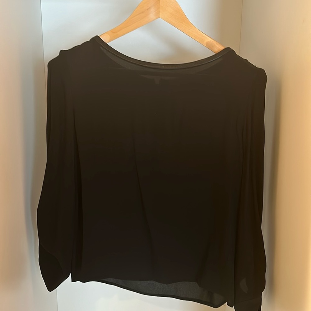 Alice + Olivia black sheer silk blouse with leather trim.